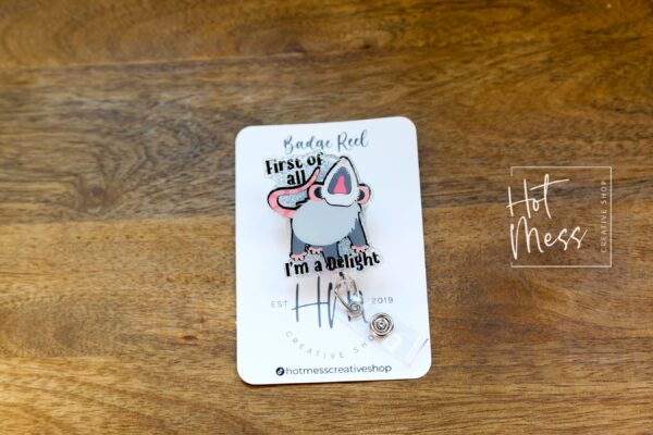 First of all I'm a delight Funny Badge Reel, Possum RN ID Holder, Retractable Badge Reel, Nurse Gift, Office ID Holder, Stocking Stuffer