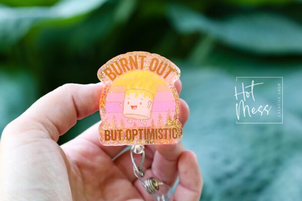 Burnt Out But Still Optimistic Badge Reel – Glitter Marshmallow Retractable ID Clip, Funny Cute Work Accessory for Healthcare & Office Staff