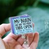 il_fullxfull.6876714690_ki6a My Brain Has Way Too Many Tabs Open Badge Reel, perfect for multitaskers, overthinkers, and chaotic good energy! Funny Badge Reel