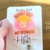 Burnt Out But Still Optimistic Badge Reel – Glitter Marshmallow Retractable ID Clip, Funny Cute Work Accessory for Healthcare & Office Staff